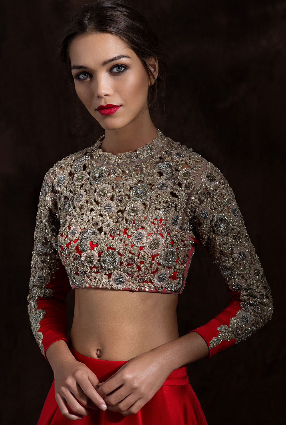 Modern royal red bridal lehenga with embroidered crop top
