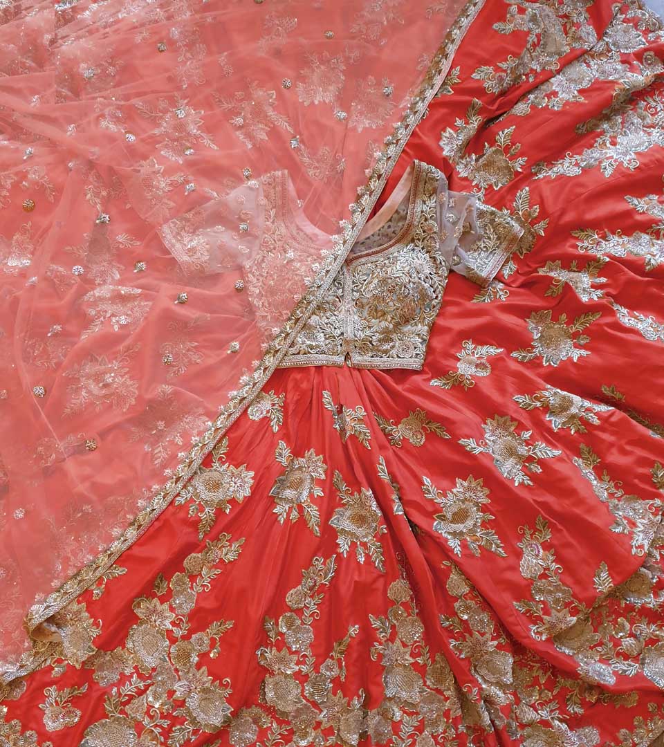 Couture red bridal lehenga with bespoke embroidery and red dupatta