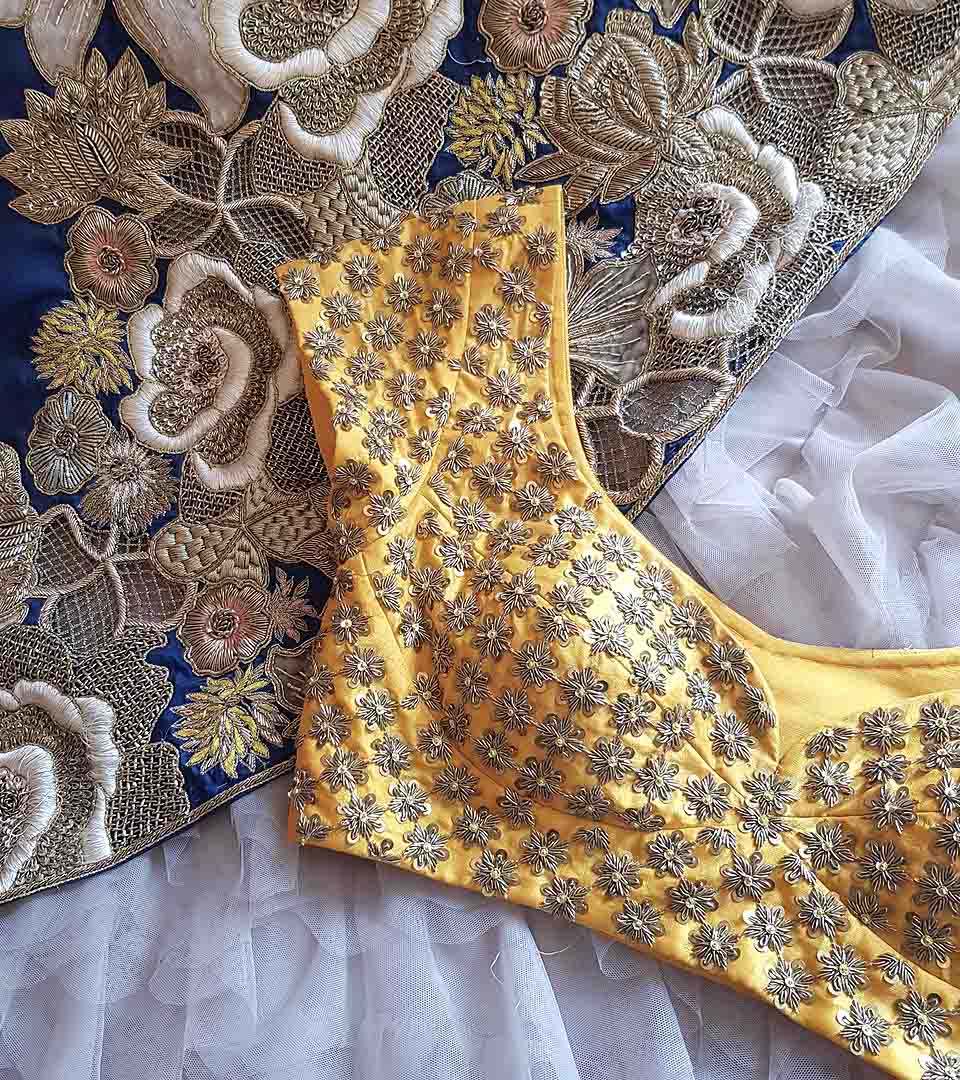 Luxury Indian bridal wear with yellow embroidered blouse 